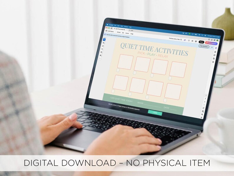 May include: A laptop displays a digital download titled "Quiet Time Activities." The screen features a grid of boxes for picking, playing, and relaxing. The text "Digital Download - No Physical Item" is at the bottom of the image.