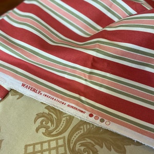 May include: Red, green, and pink striped fabric with the text "Waverly Inspirations Screen Print" on the edge.