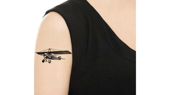 Airplane Tattoos, Images and Design Ideas - TattooList