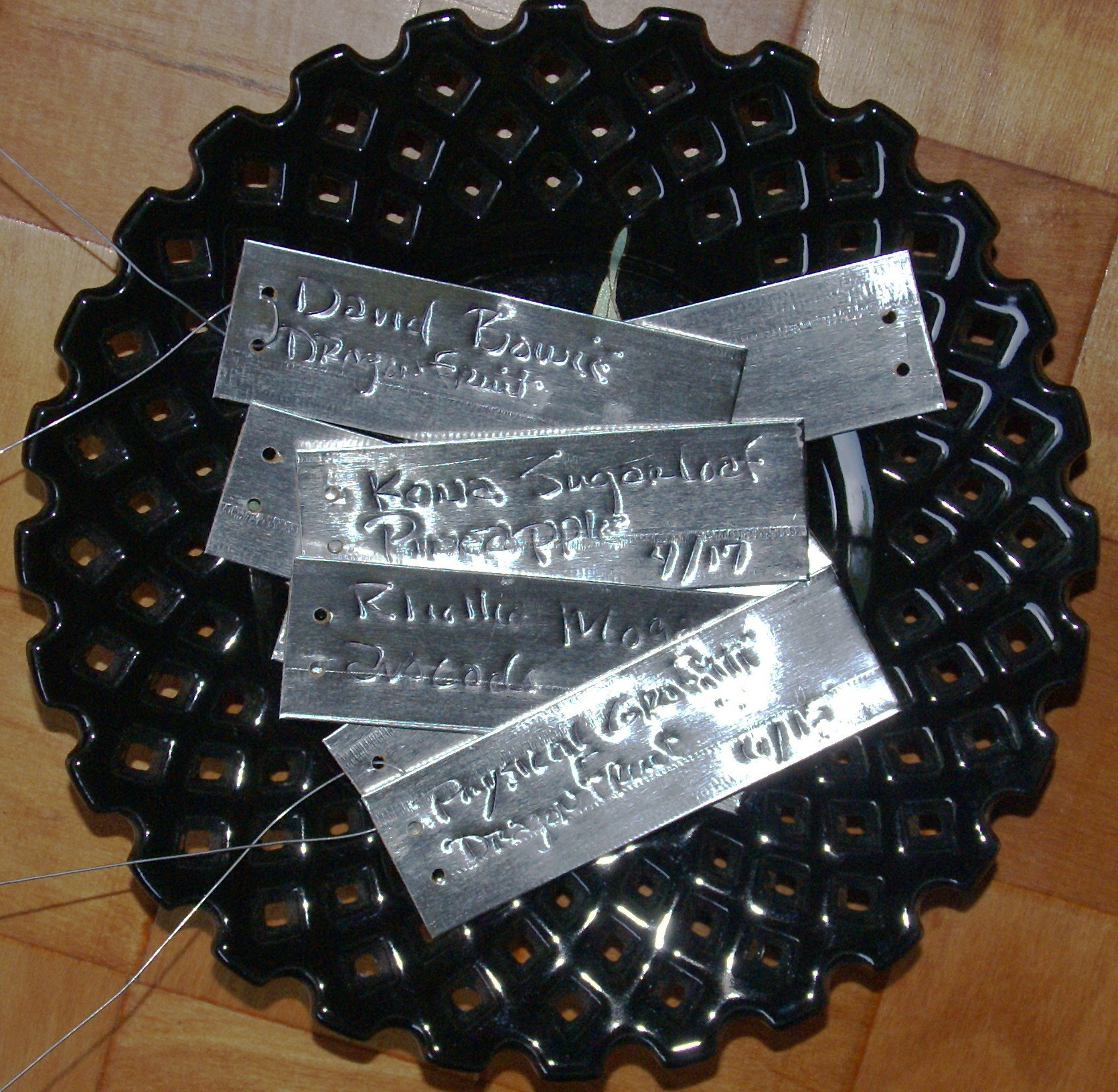 Embossed metal plant labels