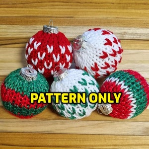 May include: Five knitted Christmas ornaments in red, white, and green. The ornaments are decorated with a simple geometric pattern. The text "PATTERN ONLY" is superimposed on the image.