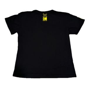 May include: Black t-shirt with a yellow graphic on the upper back. The graphic includes a square with an "X" inside a circle, and the text "X.77". The shirt is made of a soft material and has short sleeves.
