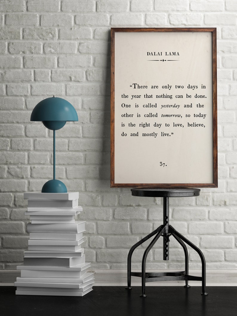 May include: A framed print with a white background and black text. The text is a quote by the Dalai Lama: "There are only two days in the year that nothing can be done. One is called yesterday and the other is called tomorrow, so today is the right day to love, believe, do and mostly live." The number 37 is printed below the quote.