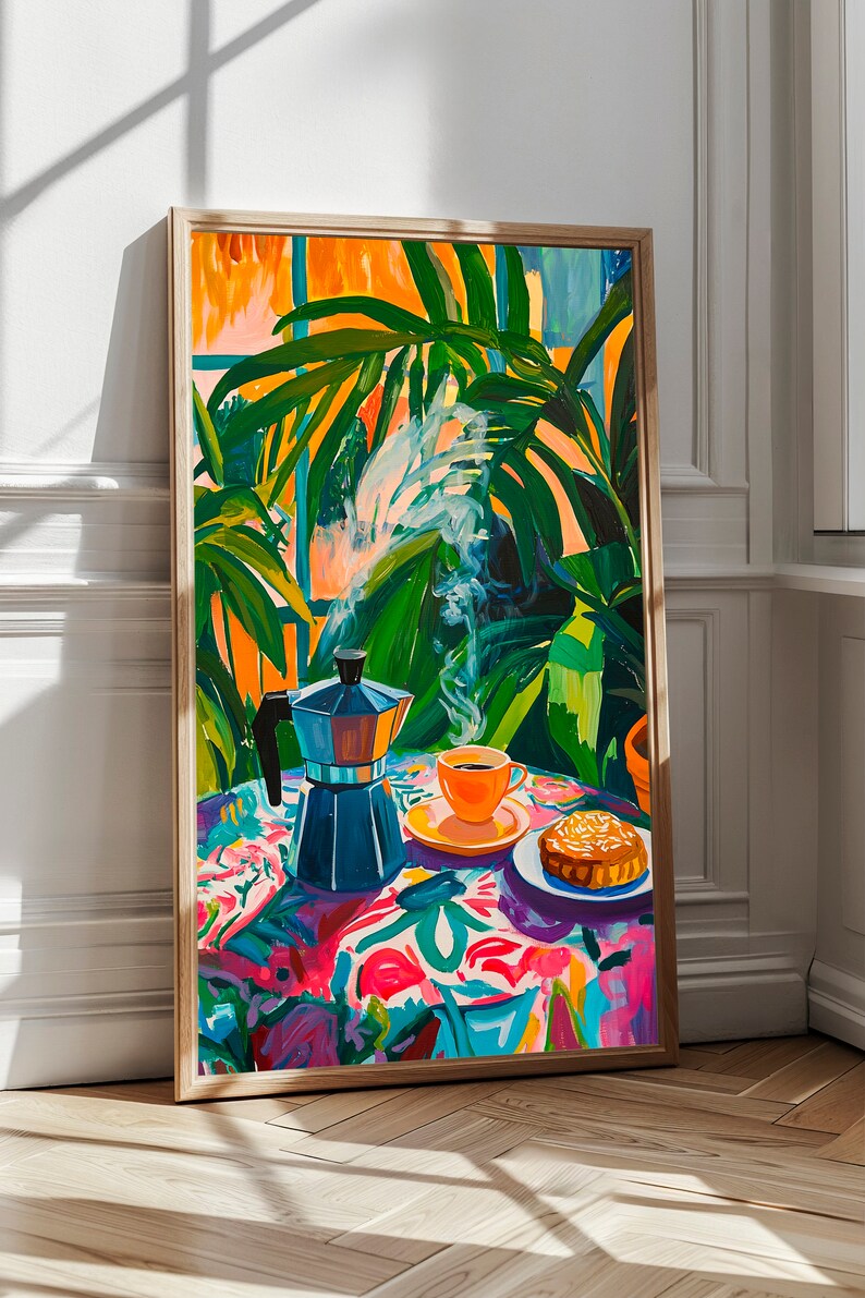 May include: A painting of a still life with a coffee pot, a cup of coffee, and a pastry on a colorful tablecloth. The coffee pot is blue and has a silver lid. The cup of coffee is orange and has a white saucer. The pastry is brown and has a white glaze. The tablecloth is covered in a floral pattern with pink, blue, green, and yellow flowers. The background is a window with green plants.