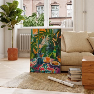 May include: A painting of a coffee pot, a cup of coffee, and a pastry on a table with a floral tablecloth. The painting is set against a backdrop of lush green foliage.