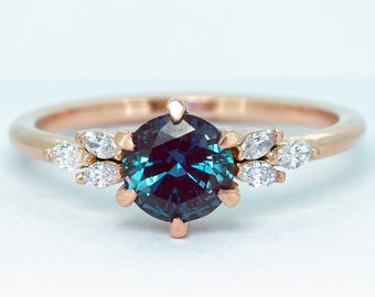 Alexandrite and diamond floral flower style engagement ring in white/rose/yellow gold or platinum