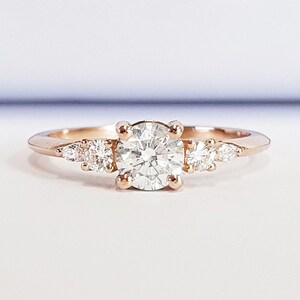 Diamond engagement ring handmade in rose gold with marquise 5 stone antique inspired