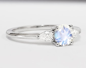 Moonstone and pear diamond 3 stone trilogy engagement ring in white/rose/yellow gold or platinum
