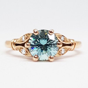 Light blue moissanite and diamond round engagement solitaire nature inspired leaf floral ring in gold handmade for her UK