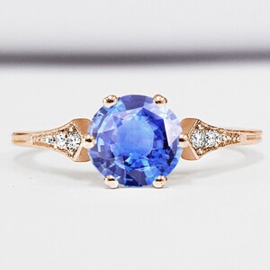 Light blue sapphire and diamond engagement ring handmade in gold or platinum antique 1920s art deco inspired