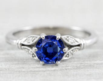 Sapphire and diamond round engagement solitaire nature inspired leaf floral ring in gold handmade for her UK