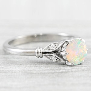 Opal and diamond engagement solitaire nature inspired leaf floral ring in gold handmade for her UK