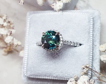 Teal Sapphire and Diamond Halo Engagement Ring