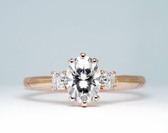 Oval and Asscher Moissanite Trilogy Engagement Ring