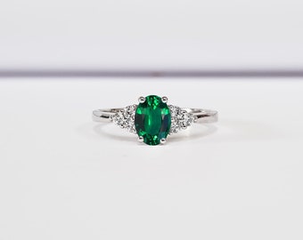 Lab Created Emerald and Diamond Oval Engagement Ring