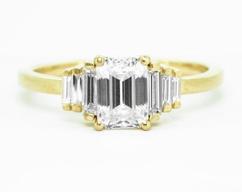 Emerald cut Moissanite and Baguette Diamond Ring