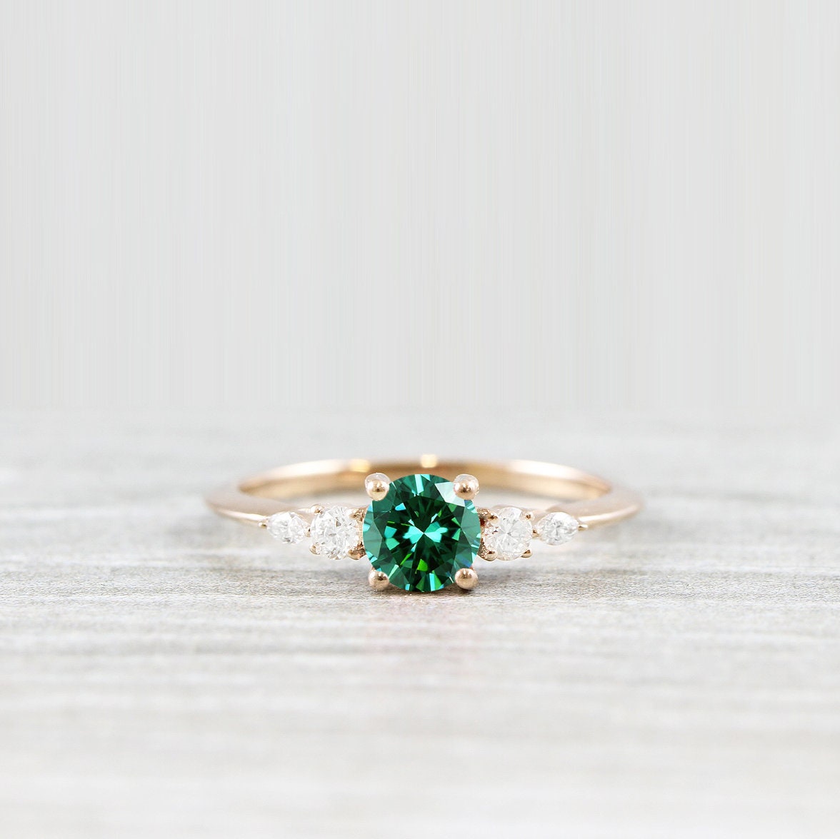 Green stone cheap engagement ring