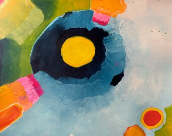 May include: Abstract painting with a blue, yellow, and black circle in the center. The background is a light blue with hints of green, orange, and pink.