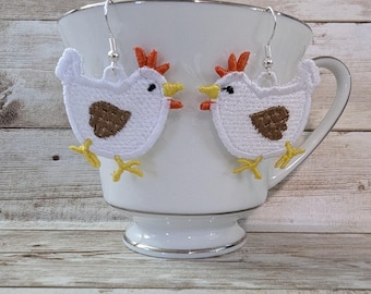 White chicken embroidered drop earrings.