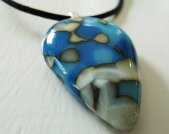 Cast glass pendant, inverted teardrop in blue and cream glass.
