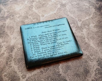 Posavasos Macbeth en cristal negro y plata metalizada