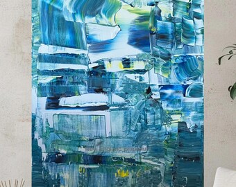 May include: Abstract painting with a textured surface, featuring shades of blue, white, and green. The artwork has a rectangular shape and is mounted on a wall. The words "New England Emporium" are visible on the bottom of the painting.