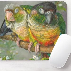 May include: Two parrots perched on a branch, one green and yellow with a black head, the other green and gray with a white head. The parrots are painted in a realistic style with detailed feathers.