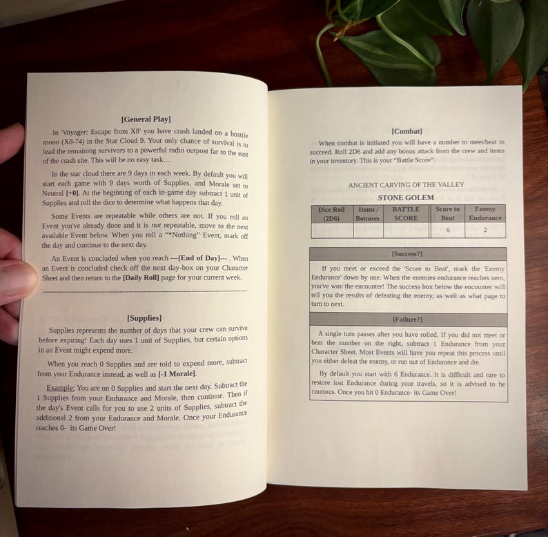 May include: An open instructional booklet for a tabletop game titled Voyager: Escape from X8. The left page details General Play and Supplies, while the right page outlines Combat mechanics, including a table for the Stone Golem enemy with stats.