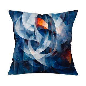 May include: Square decorative pillow with an abstract geometric design. The pillow features a pattern of overlapping shapes in shades of blue, white, and orange. The pillow is a square shape and appears to be made of a soft fabric.