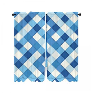 May include: A pair of window curtains with a blue and white chequered pattern. The curtains are suspended from a black rod and feature a geometric design of various shades of blue and white squares. The curtains are made of a light, semi-sheer fabric.