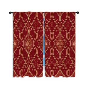 May include: A pair of red curtains with a gold geometric pattern. The curtains are made of a soft, luxurious fabric and have a subtle sheen.