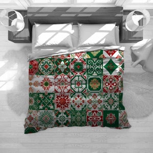 May include: A green, red and white patterned duvet cover with a patchwork design. The duvet cover features a variety of geometric shapes and floral motifs.