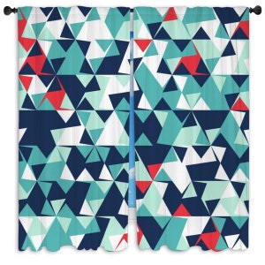 May include: A pair of curtains with a geometric pattern of blue, white, and red triangles.
