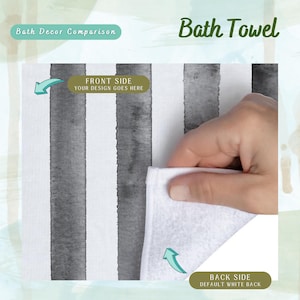 May include: A white bath towel with gray watercolor stripes. The towel is folded in half and the back side is white. The text "FRONT SIDE YOUR DESIGN GOES HERE" is on the towel. The text "BACK SIDE DEFAULT WHITE BACK" is on the towel.