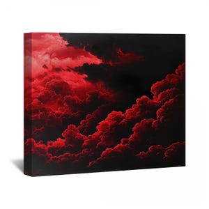 May include: A canvas print featuring a dramatic cloudscape. The artwork showcases a vibrant contrast between deep red and black hues, creating a visually striking and intense atmosphere. The clouds are depicted with a textured, almost three-dimensional quality.