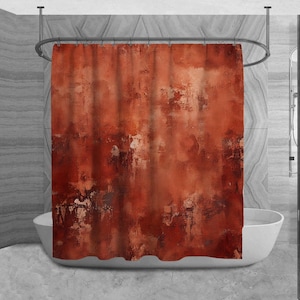 May include: A red and orange abstract shower curtain with a textured, distressed look. The curtain is hanging in a bathroom with a white bathtub.