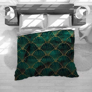 May include: A green and gold duvet cover with a geometric pattern of overlapping scallop shapes. The duvet cover is made of soft, comfortable fabric and features a luxurious, elegant design.