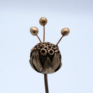 Botanical - bronze flower "alveolate"