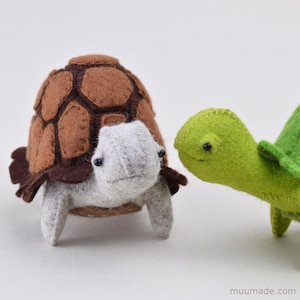 Two felt turtles. Their sewing pattern & instructions is available for instant download from muumade.etsy.com.