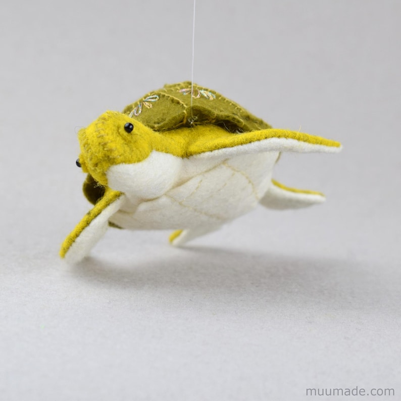 A felt sea turtle. Its sewing pattern & instructions is available for instant download from muumade.etsy.com.