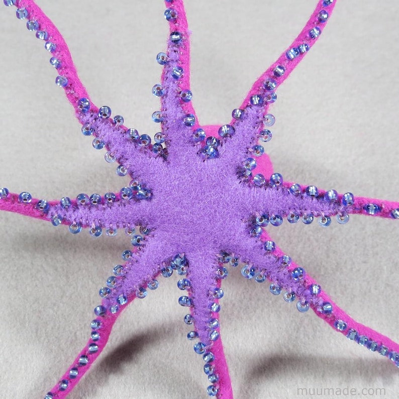 A felt octopus. Its sewing pattern & instructions are available for instant download from Muumade.etsy.com..