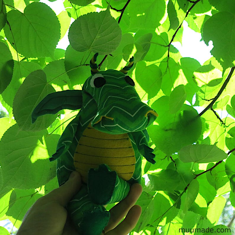 A soft fabric dragon plushie. Its sewing pattern & instructions set is available for instant download from muumade.etsy.com.