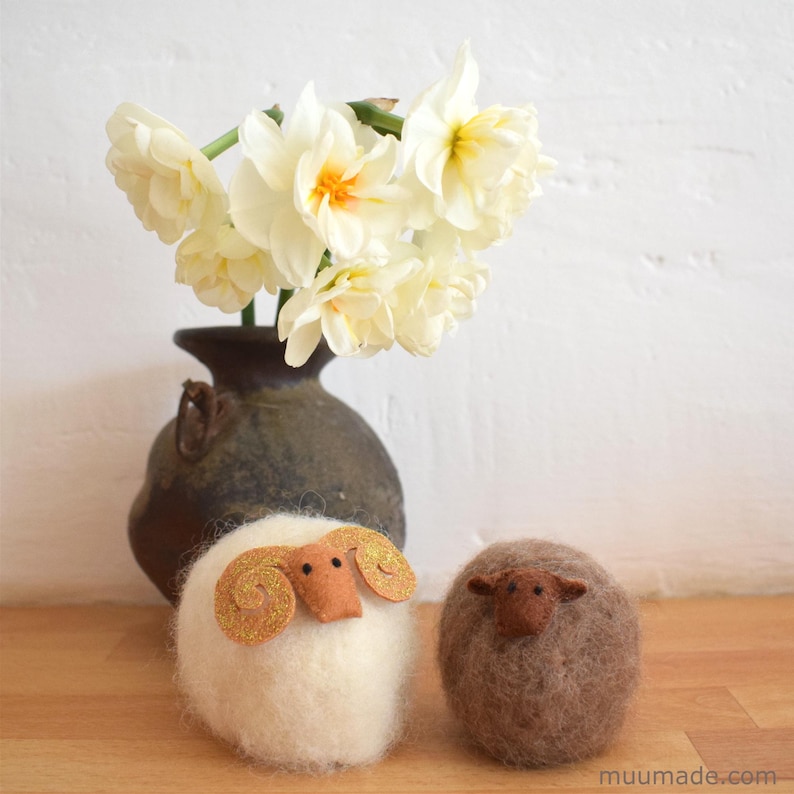 A pair of adorable yet sophisticated looking minimalistic sheep. Their sewing patterns are downloadable and printable. They come with detailed instructions.
