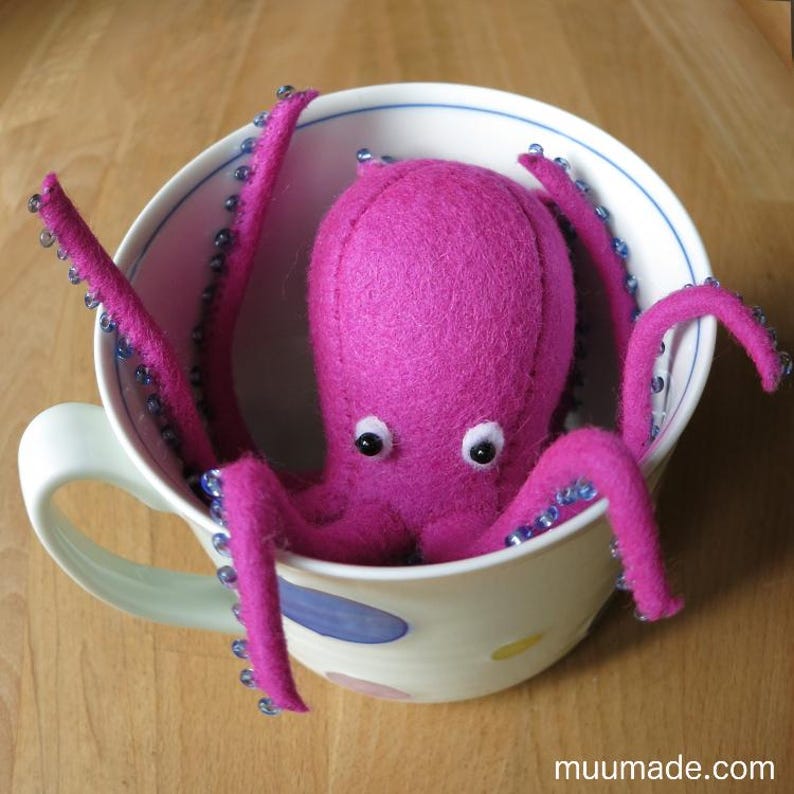 A felt octopus. Its sewing pattern & instructions are available for instant download from Muumade.etsy.com..