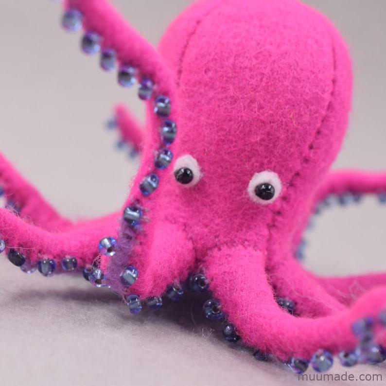 A felt octopus. Its sewing pattern & instructions are available for instant download from Muumade.etsy.com..