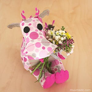 A soft fabric dragon plushie. Its sewing pattern & instructions set is available for instant download from muumade.etsy.com.