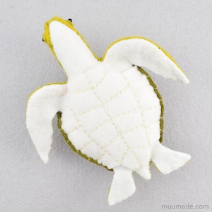 A felt sea turtle. Its sewing pattern & instructions is available for instant download from muumade.etsy.com.