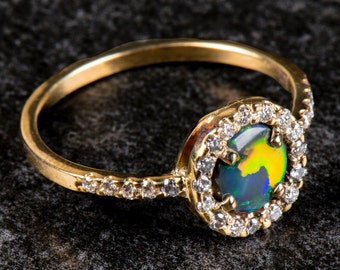 Australian Opal 9ct Gold and Diamond Ring.
