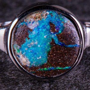 Boulder Opal Rhodium protected 925 Silver Ring. Size 6.5 US.