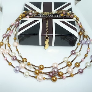 Favolosa collana Butler & Wilson a quattro fili di perle finte multicolori e perline